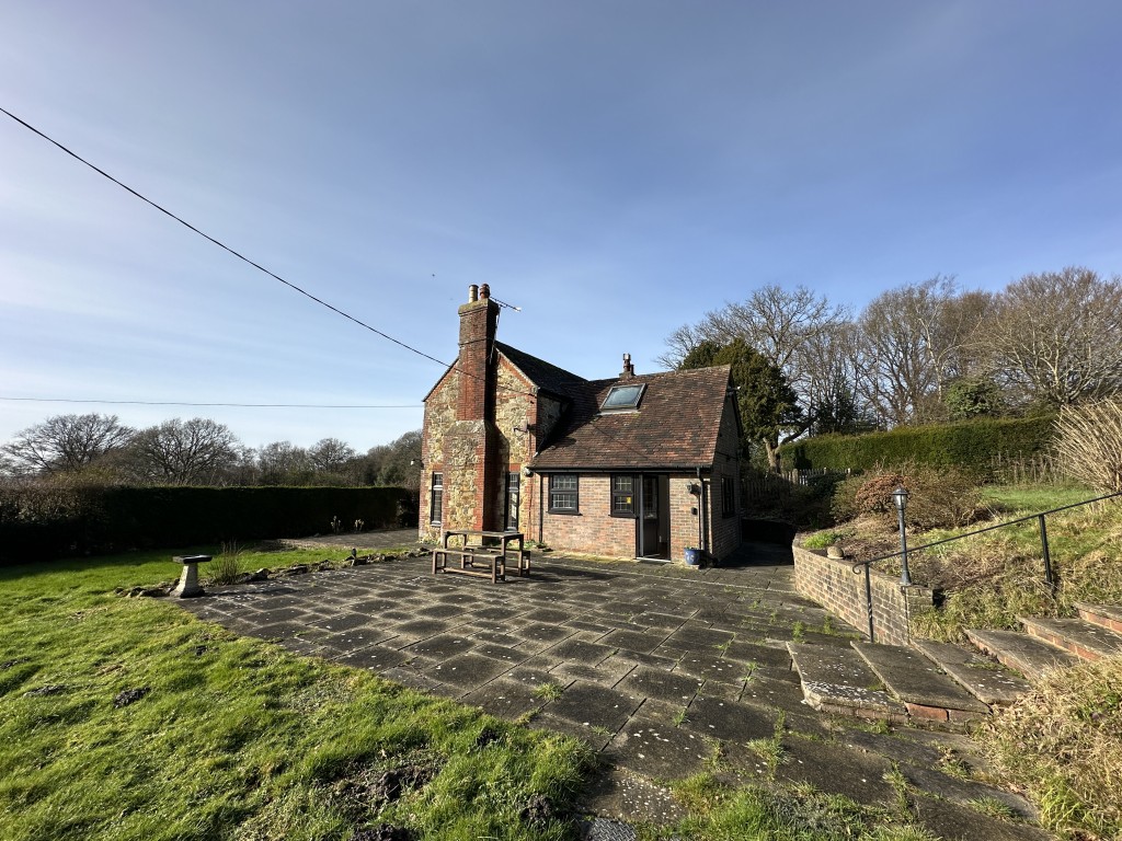 Lot: 135 - DETACHED COTTAGE FOR REFURBISHMENT ON 1.23 ACRES OF GROUNDS - External of Property with surrounding gardens